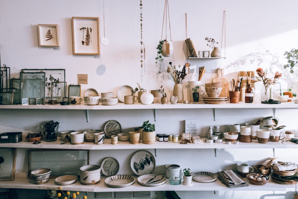assorted-ceramics-on-wooden-shelves-3626588